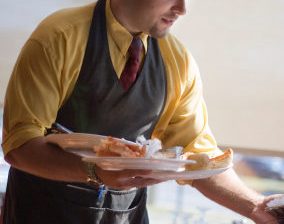 waitperson serving food