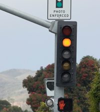 red light camera ticket settlement