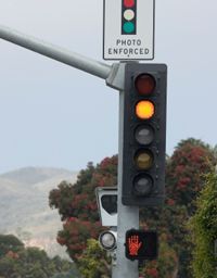 red light camera ticket settlement