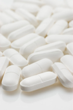 Pills on white background