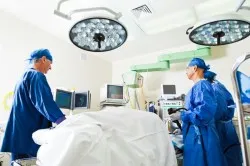 Surgery room with surgeon and nurses
