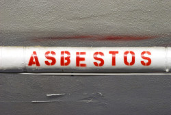 Manditory labeling of the Asbestos wraped water lines through out the old Roseburg Oregon fire Station.