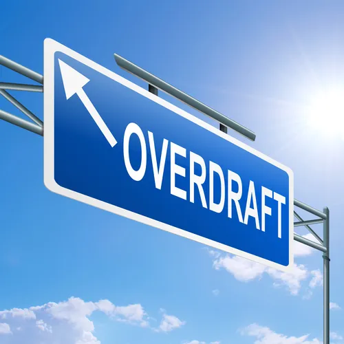 Illustration depicting a highway gantry sign with an overdraft concept. Blue sky background.