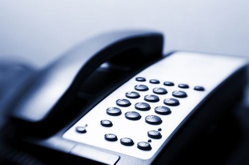 Close-up image of a telephone keypad. Selective focus produced with lensbaby