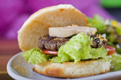 Most expensive hamburger underpaying workers