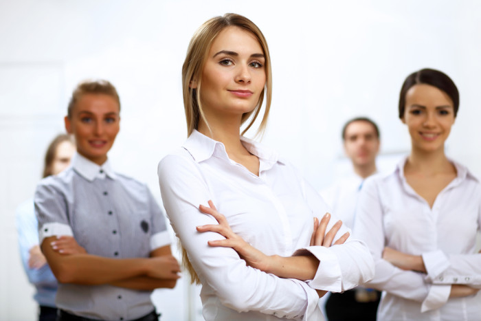 Group of successful young business persons together