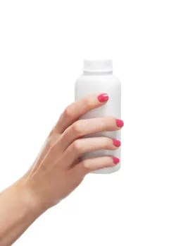 hands holding talcum powder