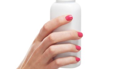 hands holding talcum powder
