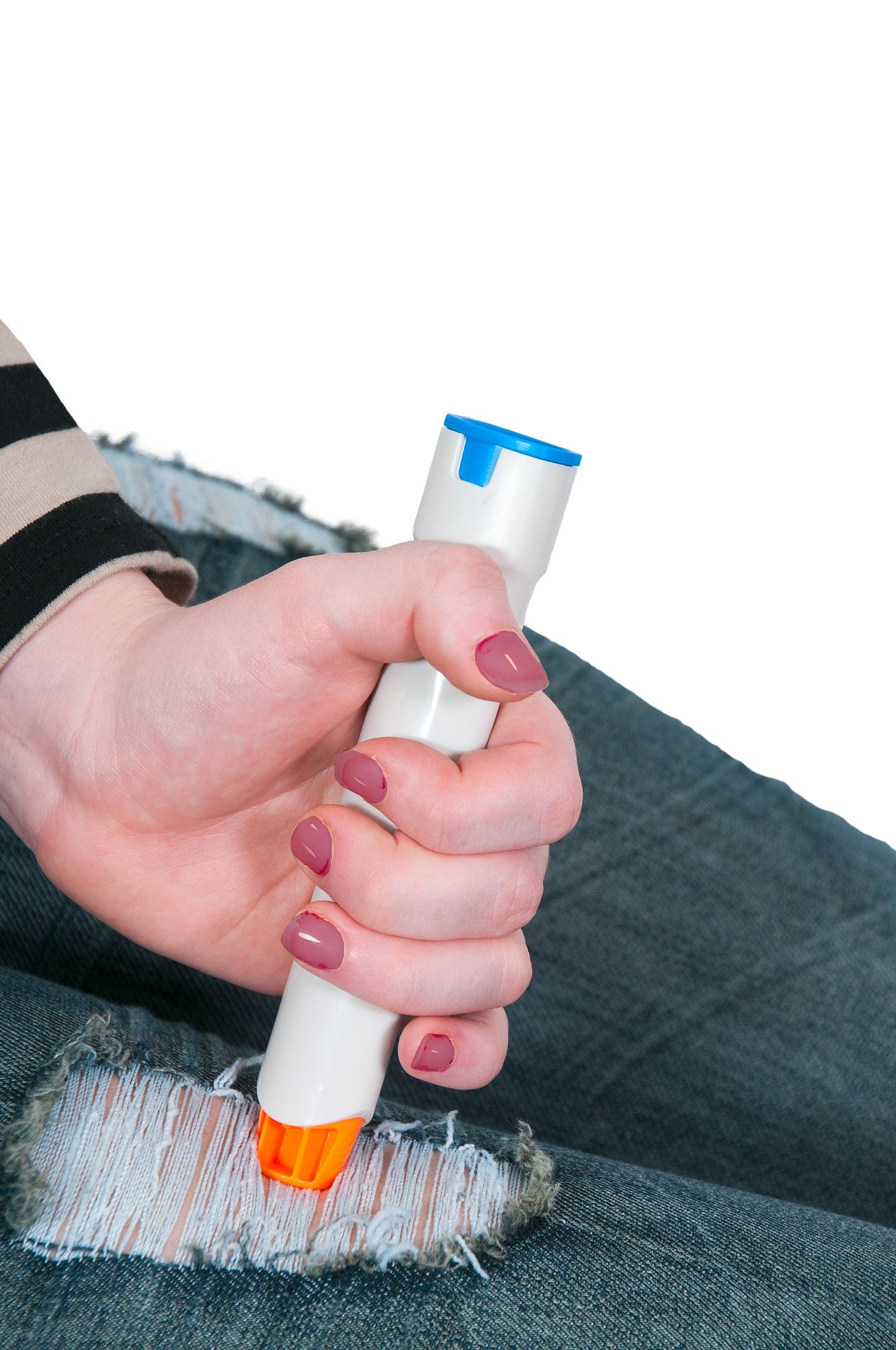 Woman injecting emergency medicine into her leg