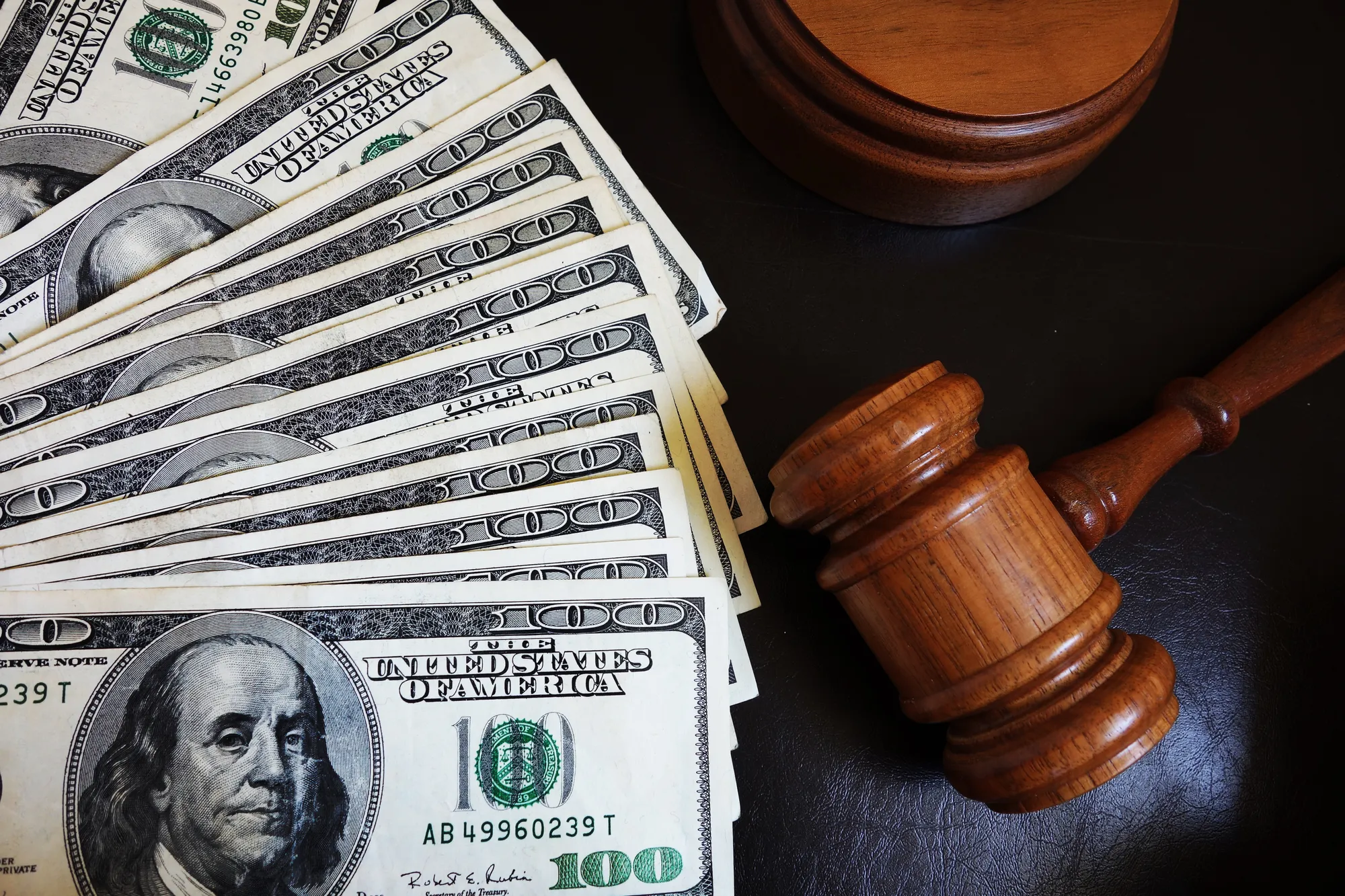 Court gavel with money