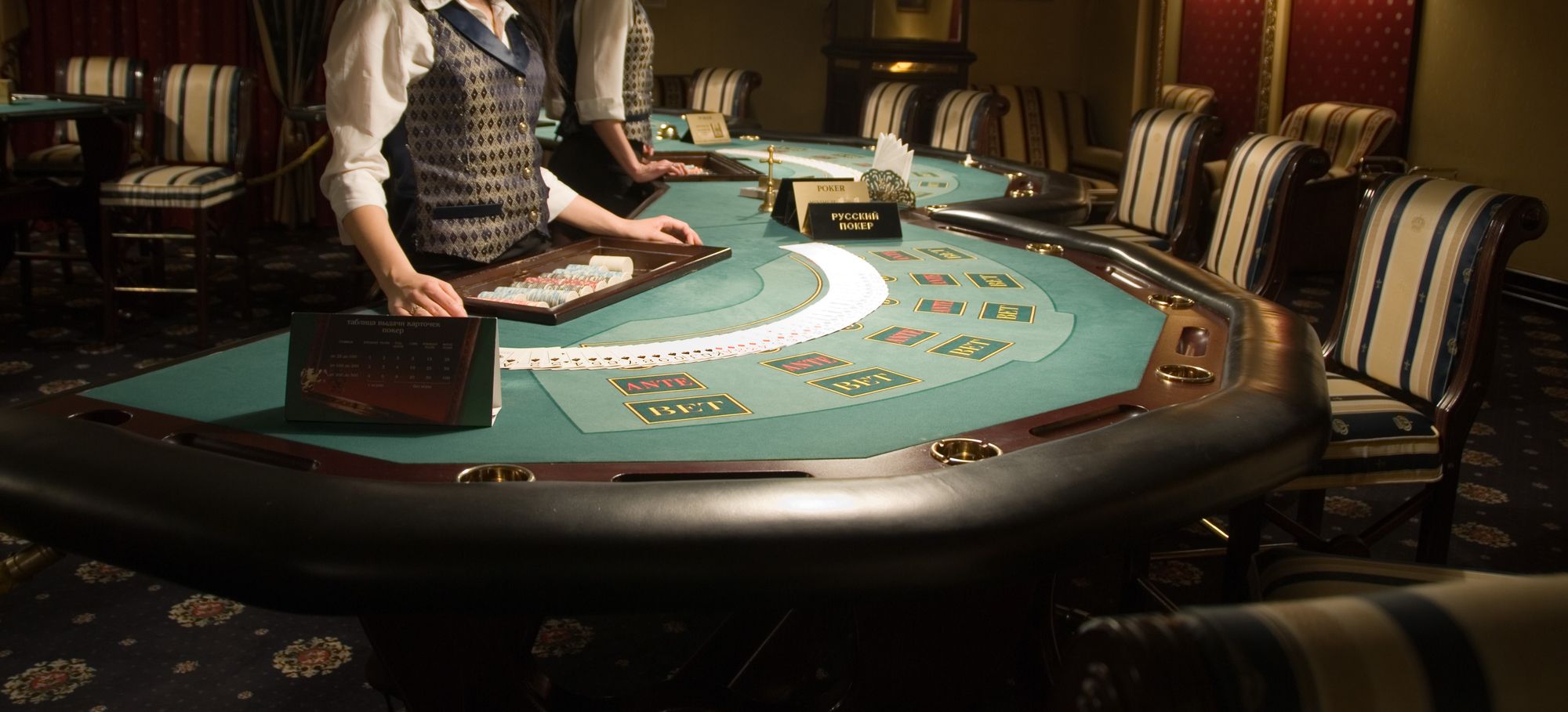 modern and beautiful casino interior, focus of poker playing tables