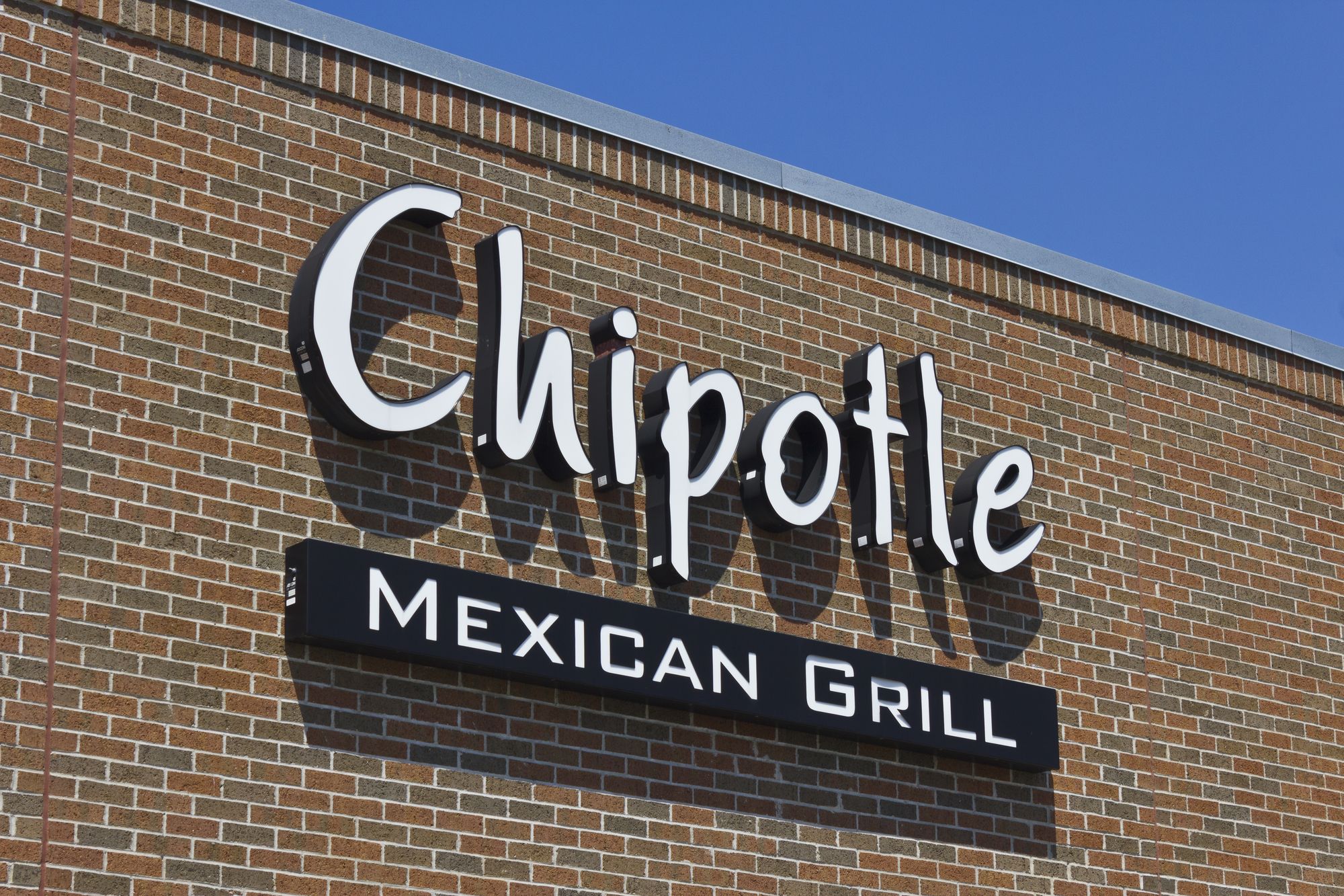 Indianapolis - Circa May 2016: Chipotle Mexican Grill Restaurant. Chipotle is a Chain of Burrito Fast-Food Restaurants VII