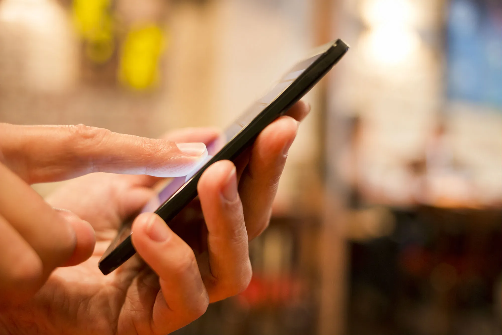 man-using-smart-phone