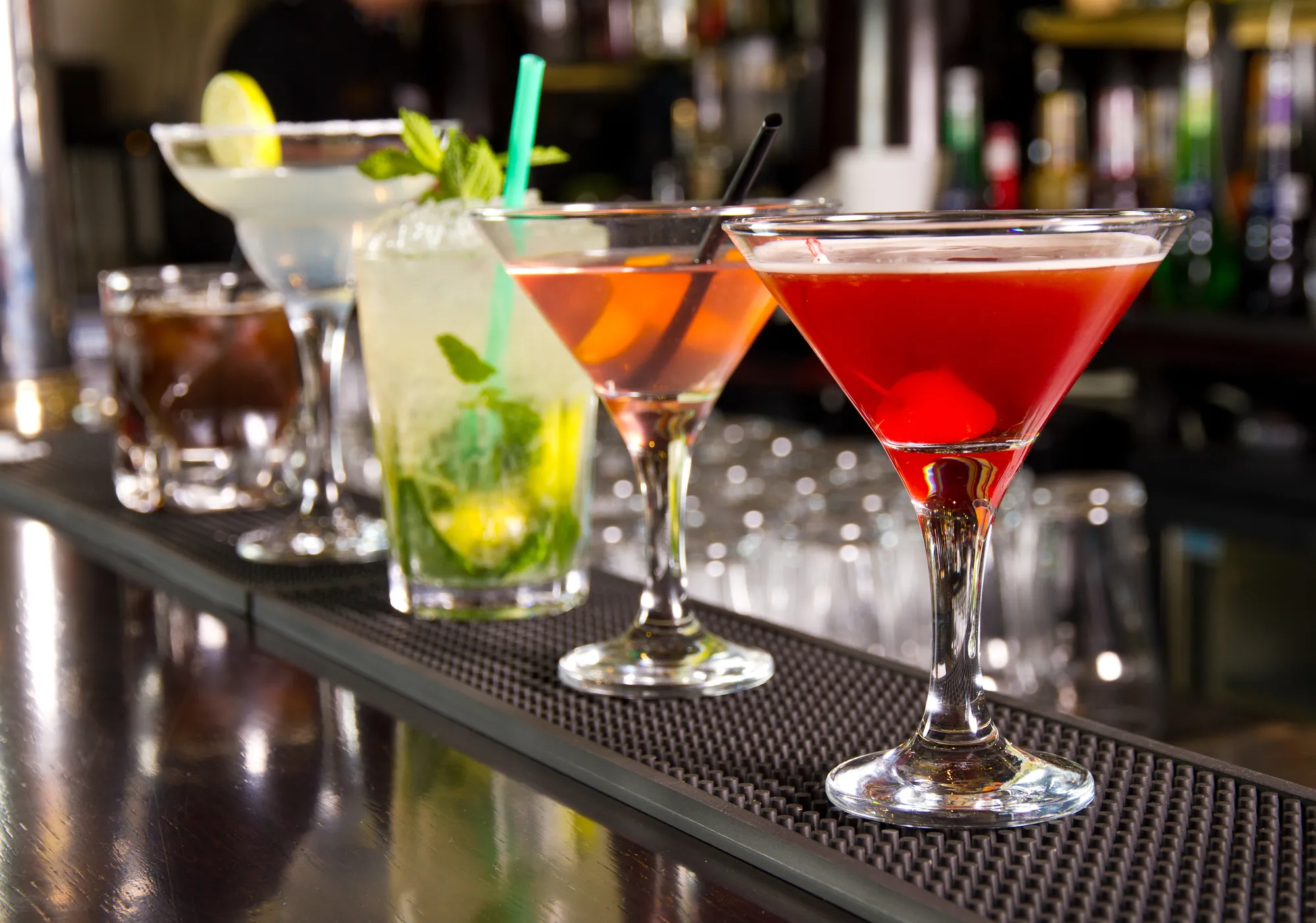 Five cocktails on the bar counter