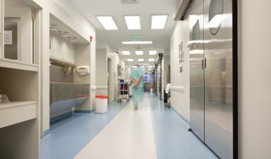 doctor walking in a hospital corridor