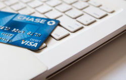 Debit card of Chase Bank on an Apple MacBook White keyboard