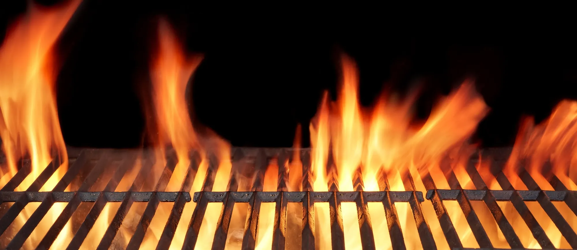 Barbecue Fire Grill close-up, isolated on Black Background
