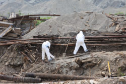 asbestos lung cancer workers hazmat suits