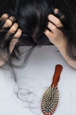 woman hair loss