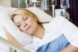 vaginal mesh pelvic mesh woman hospital bed