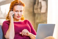 woman-with-laptop-and-phone