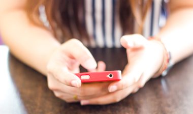 cell phone in hands, TCPA