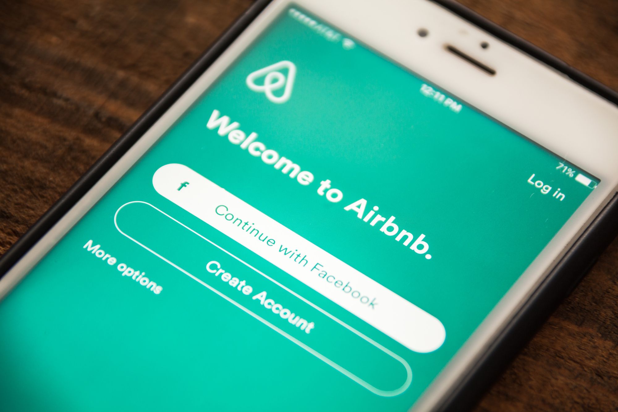 LAS VEGAS, NV - August 26,2016: Vignette Selective Focus Apple iPhone 6+ with Airbnb application login showing on screen. Airbnb is a vacation rental app for smartphones.