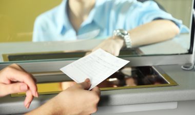 overdraft fees bank credit union teller window deposit withdrawal