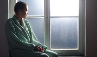 baby powder talcum powder ovarian cancer woman at window
