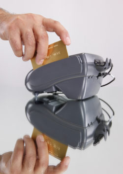 Swiping a credit or debit card through a transaction terminal