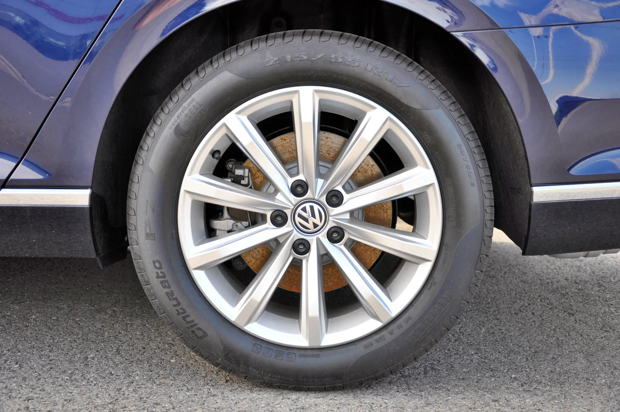 PRAGUE, THE CZECH REPUBLIC, 02.08.2015 - detail of volkswagen wheel with logo vw. Black tire and aluminium disc