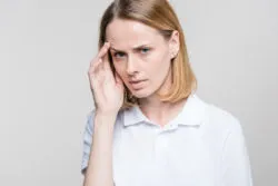 woman with headache, hypertension