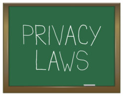 Illustration depicting a green chalkboard with a privacy laws concept.