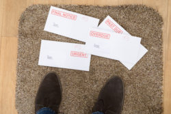 Feet Of A Person And Important Letters