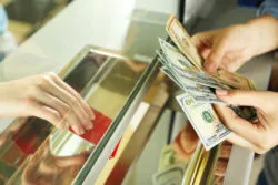 bank teller cash overdraft fees