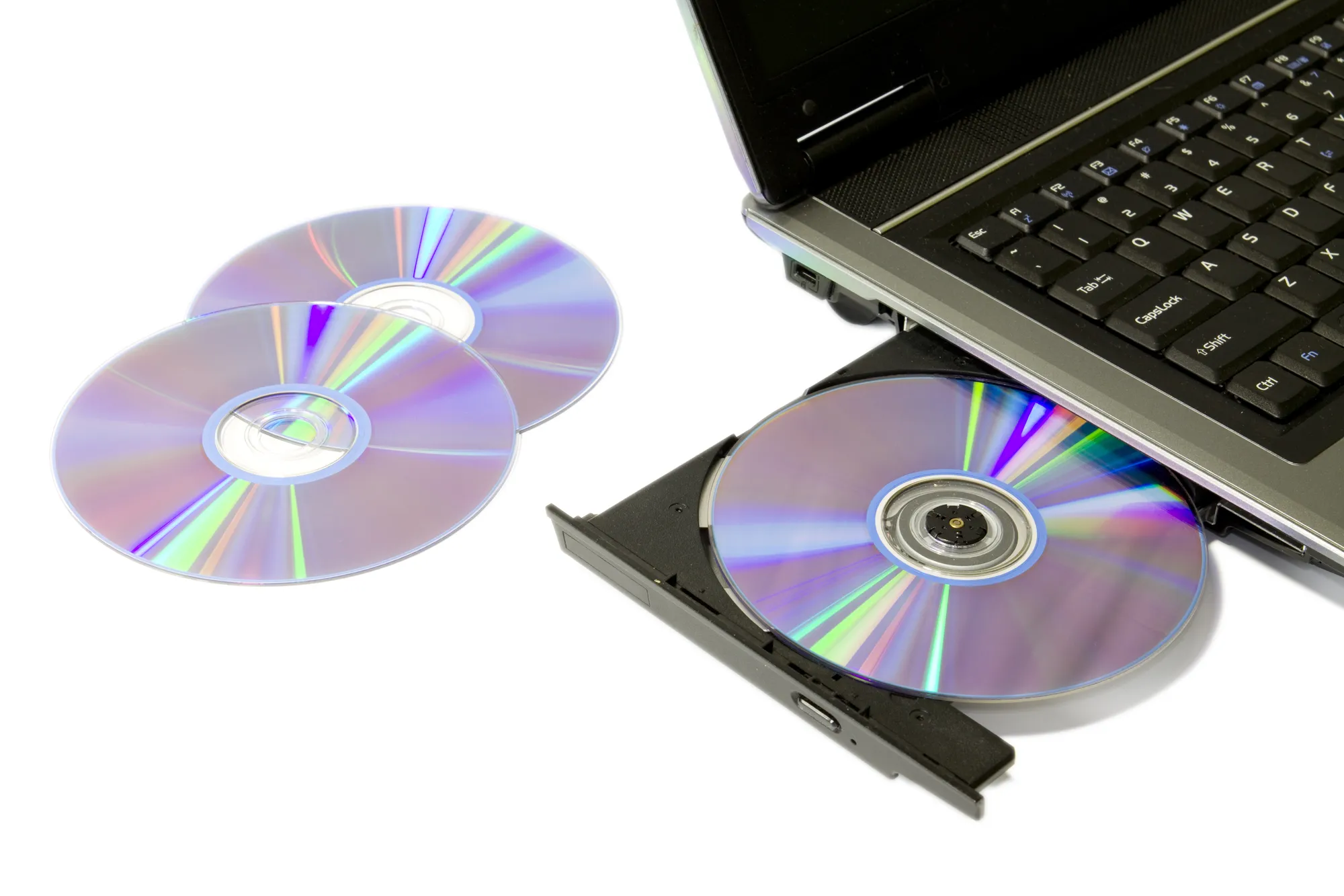 detail of a laptop with open and loaded dvd drive