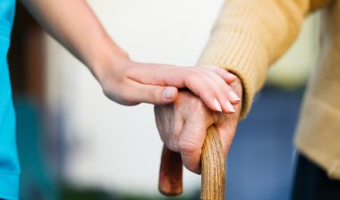 hip implant hip replacement hands walking cane