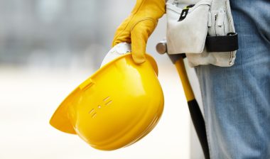 asbestos mesothelioma construction worker yellow hard hat