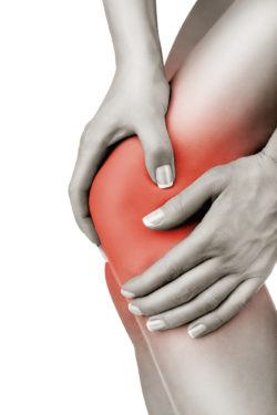 Woman having knee pain isolated on a white background