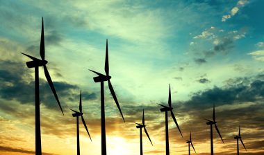 ESCO deregulated utility Wind turbines farm at sunset