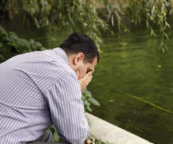 stressed male on park bench, risperdal