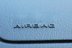 Airbag caption on the car leather dashboard