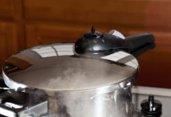 pressure cooker releasing steam