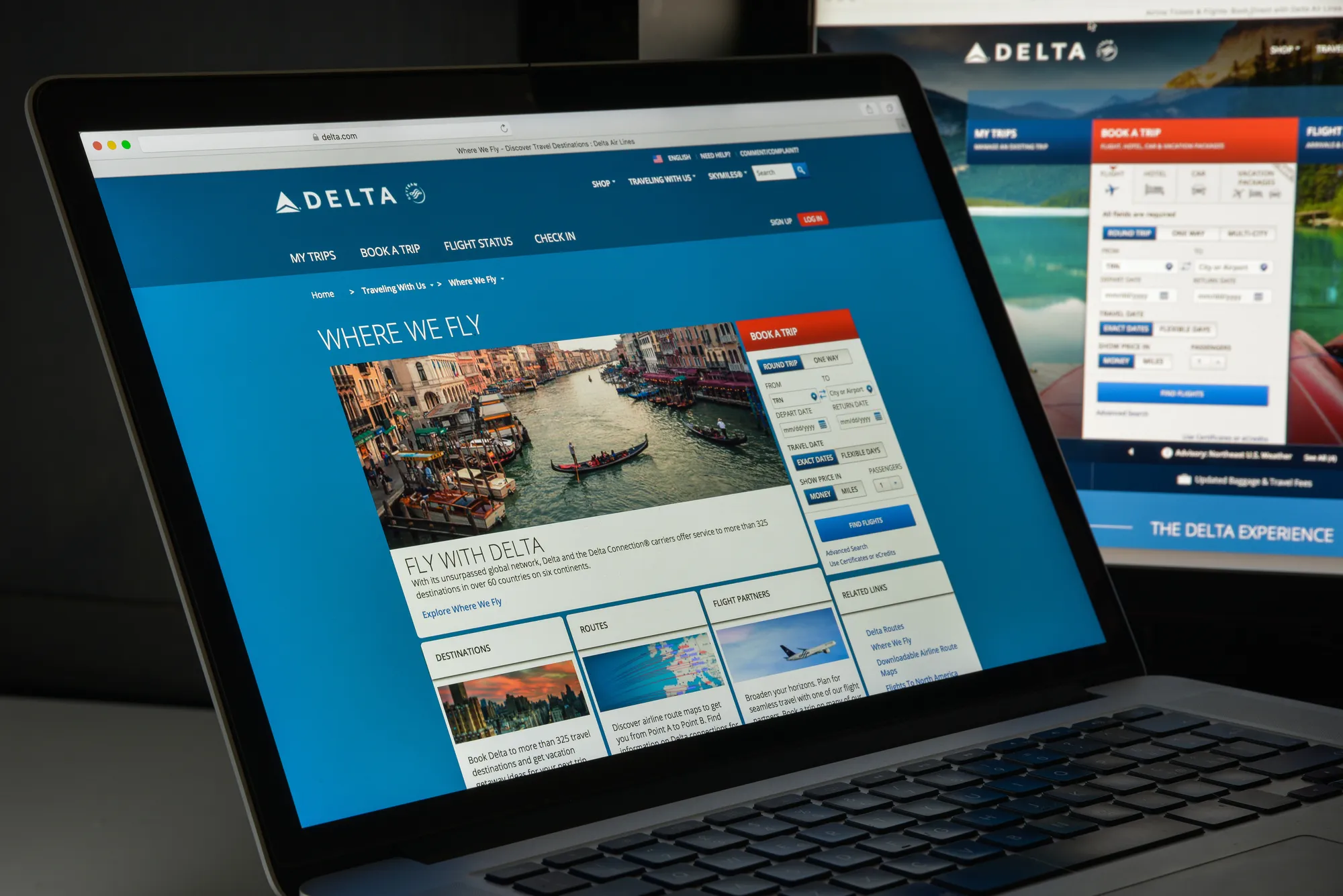 Milan, Italy - August 10, 2017: Delta website homepage. It is a major American airline, with its headquarters and largest hub at Hartsfield–Jackson Atlanta International Airport. Delta logo visible.