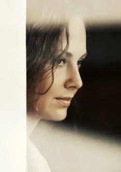 Essure birth control sad woman window