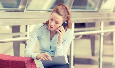 TCPA robocalls woman on phone
