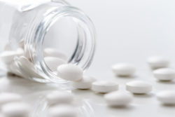 bottle of pills, close up, glass jar
