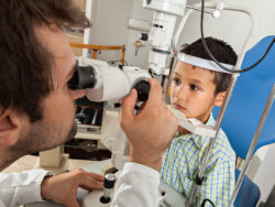Avastin injection floaters boy in eye exam