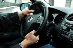 young man who's driving, steering wheel