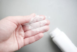 woman hand with baby powder